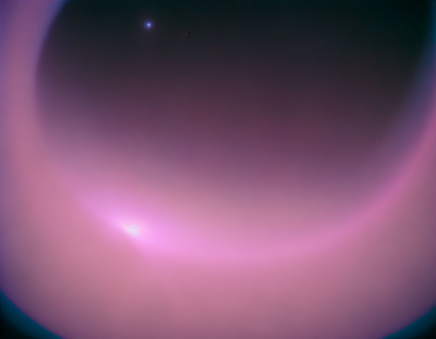Earth's horizon from space with purple and pink ionosphere glow under star-speckled sky
