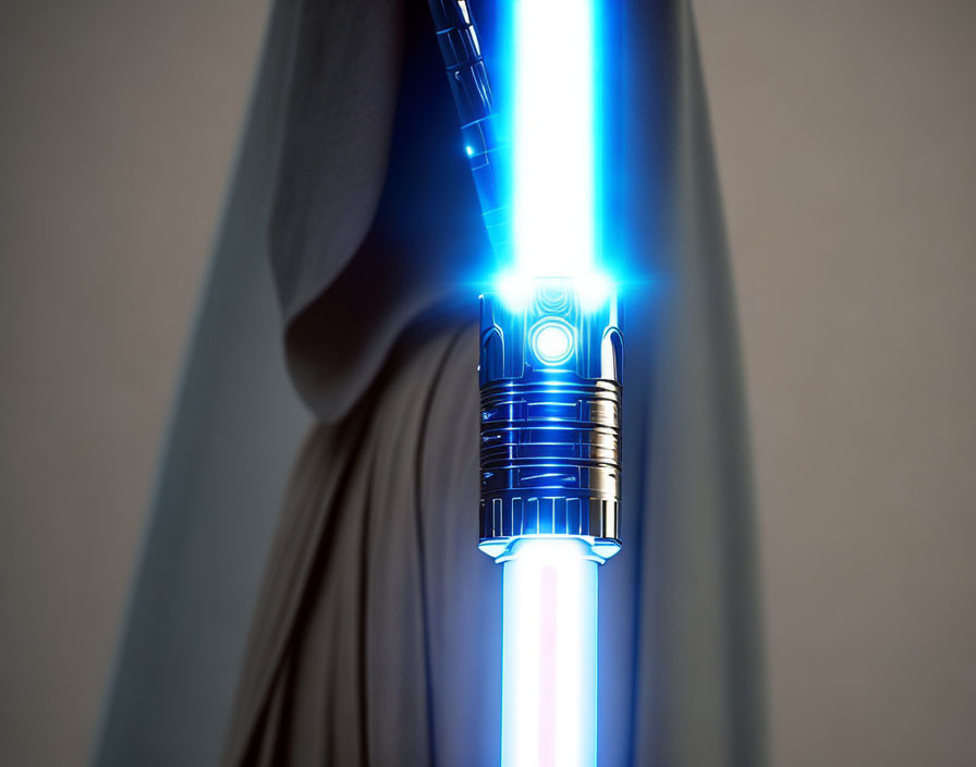 Close-up of blue lightsaber with grey cloaked figure holding it