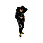 Trendy streetwear outfit with black hoodie, cap, graphic pants, and yellow sneakers