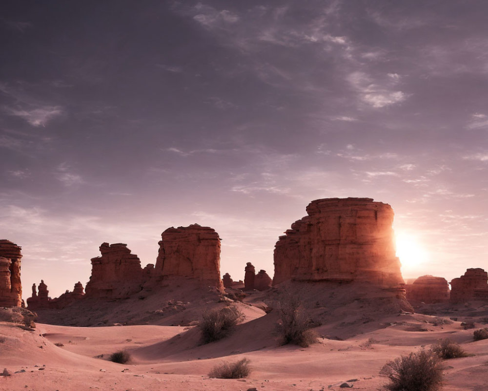 Sunset desert landscape with towering rock formations and pink sky