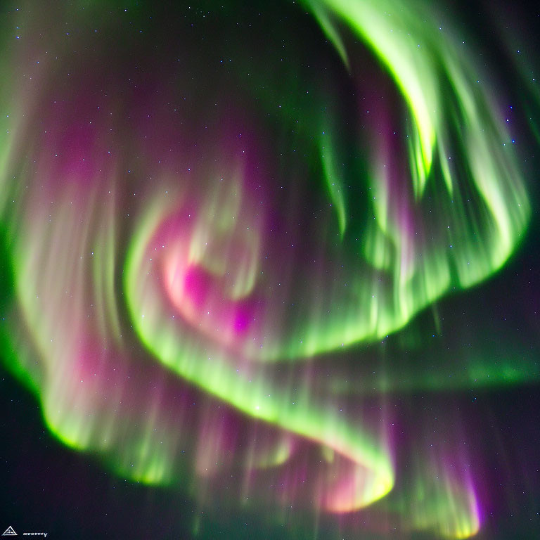 Colorful Aurora Borealis Lights in Green and Pink Swirls