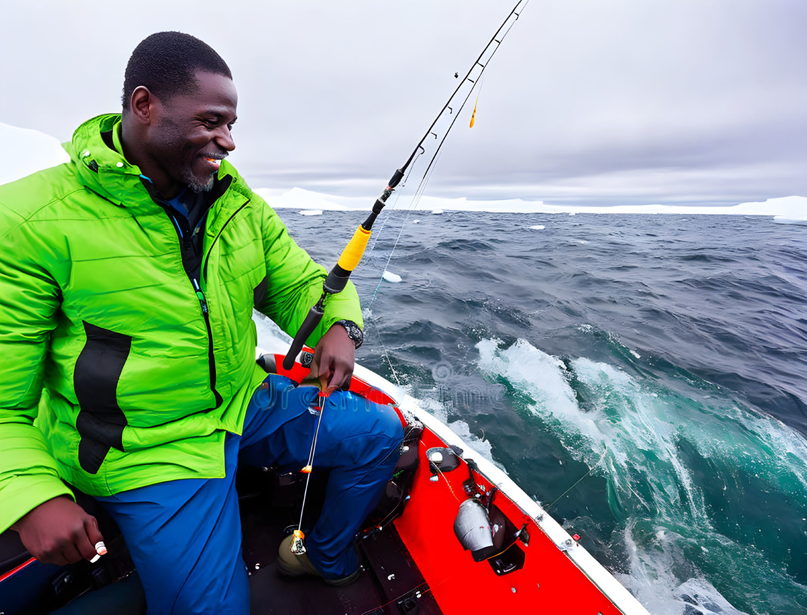 African man in the green jacket fishing 