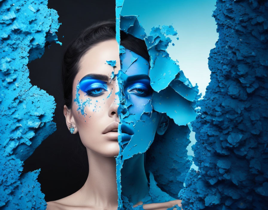 Abstract portrait of a woman with split face and bold blue makeup