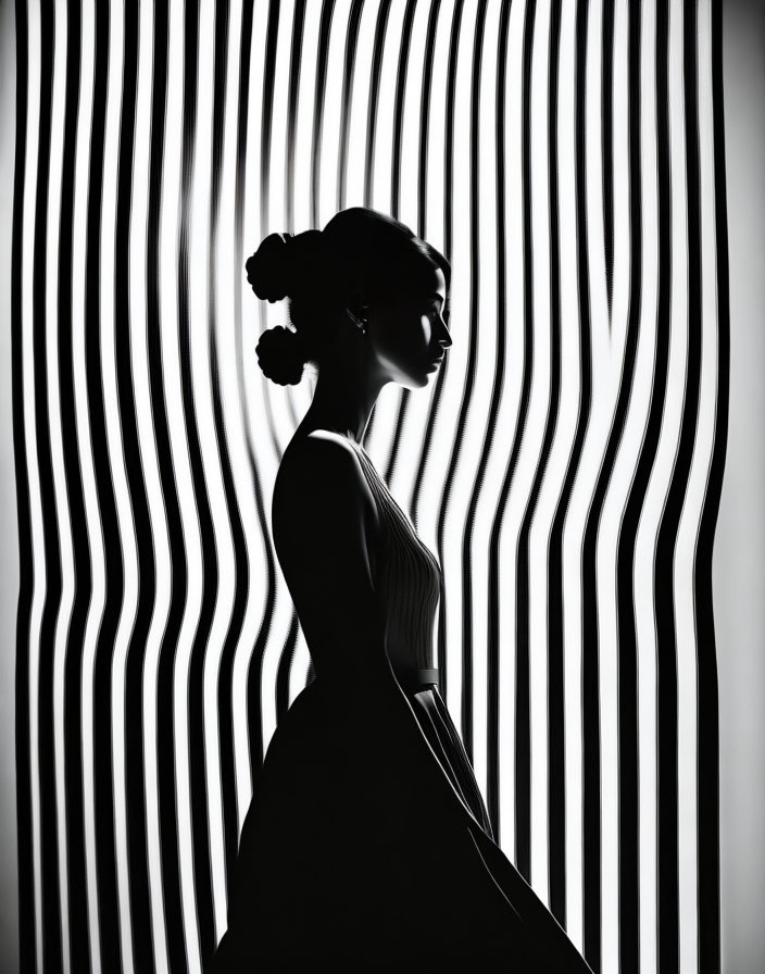 Contrasty silhouette of woman with vertical light stripes