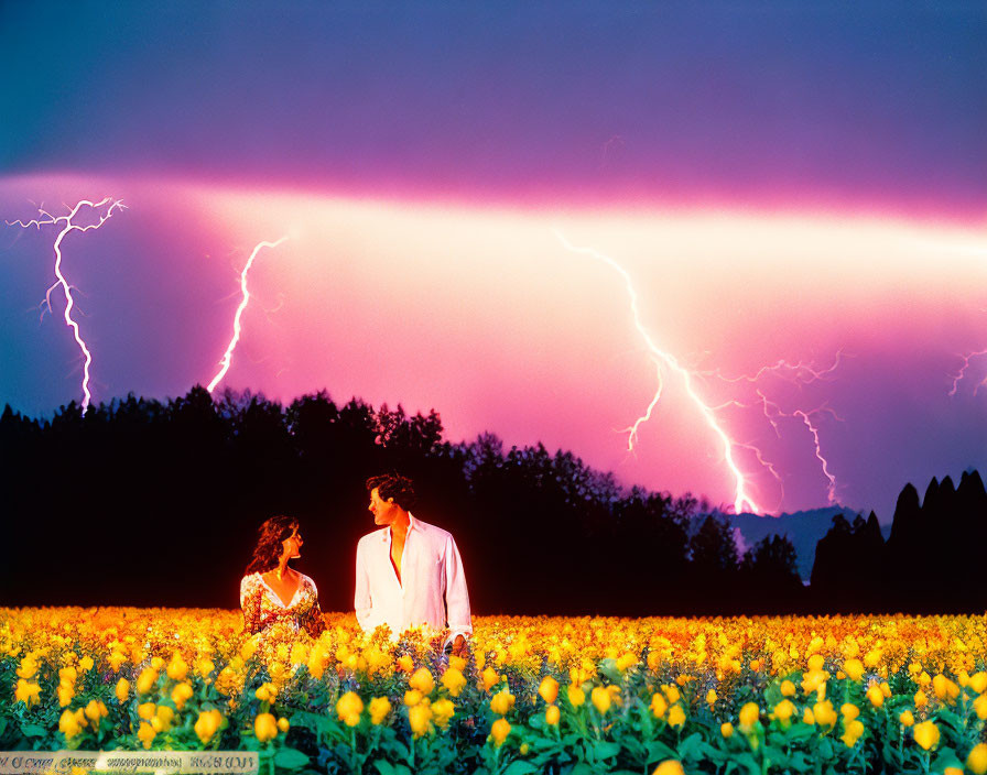 Romantic couple in yellow flower field under dramatic purple sky with lightning.
