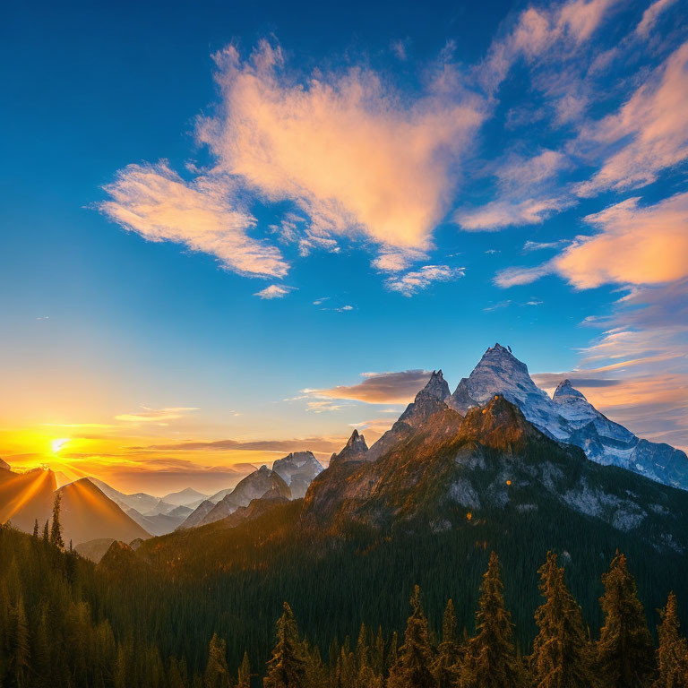 Vibrant mountain sunrise with golden clouds over forested landscape