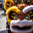 Vibrant lion dance costumes in parade with detailed lead lion face