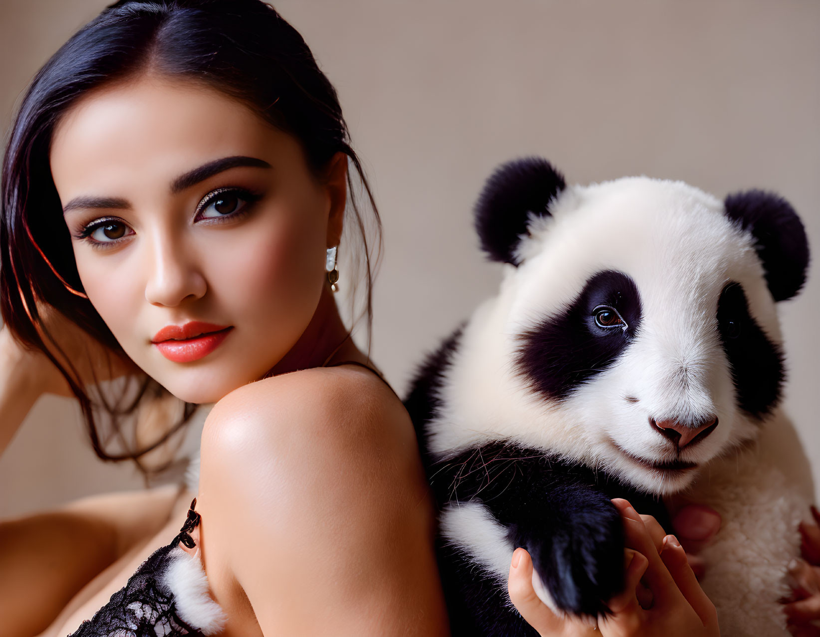 A beautiful girl with a panda