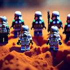 Futuristic soldier toy figures on alien desert terrain under warm light