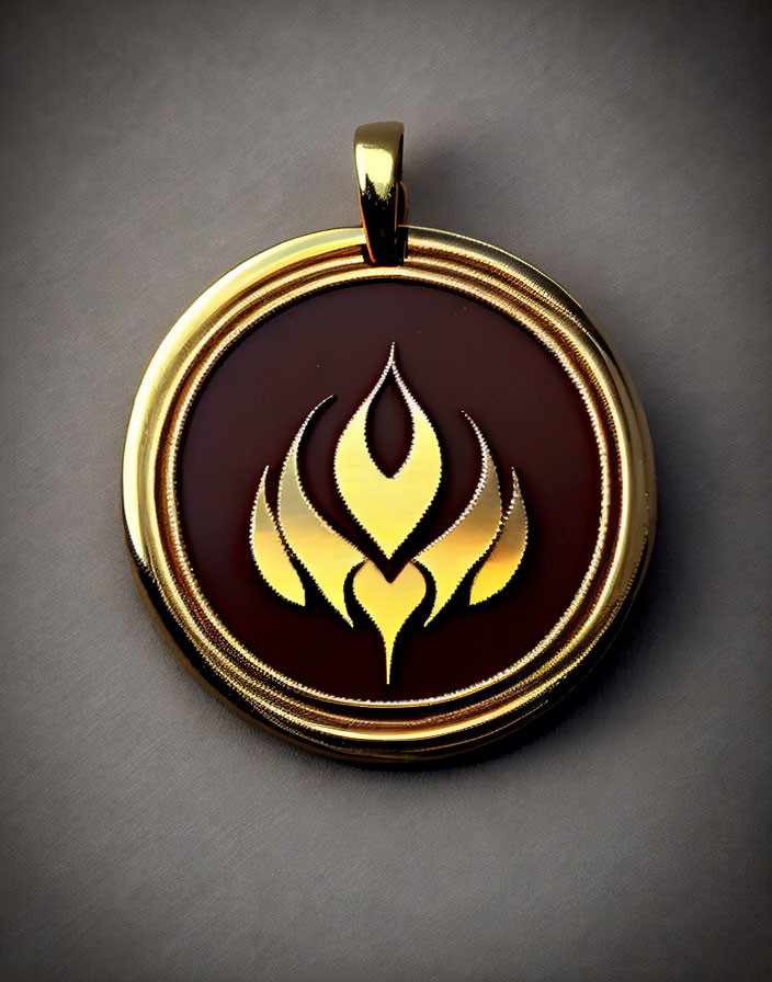 Gold-tone Circular Pendant with Stylized Flame Design on Maroon Background