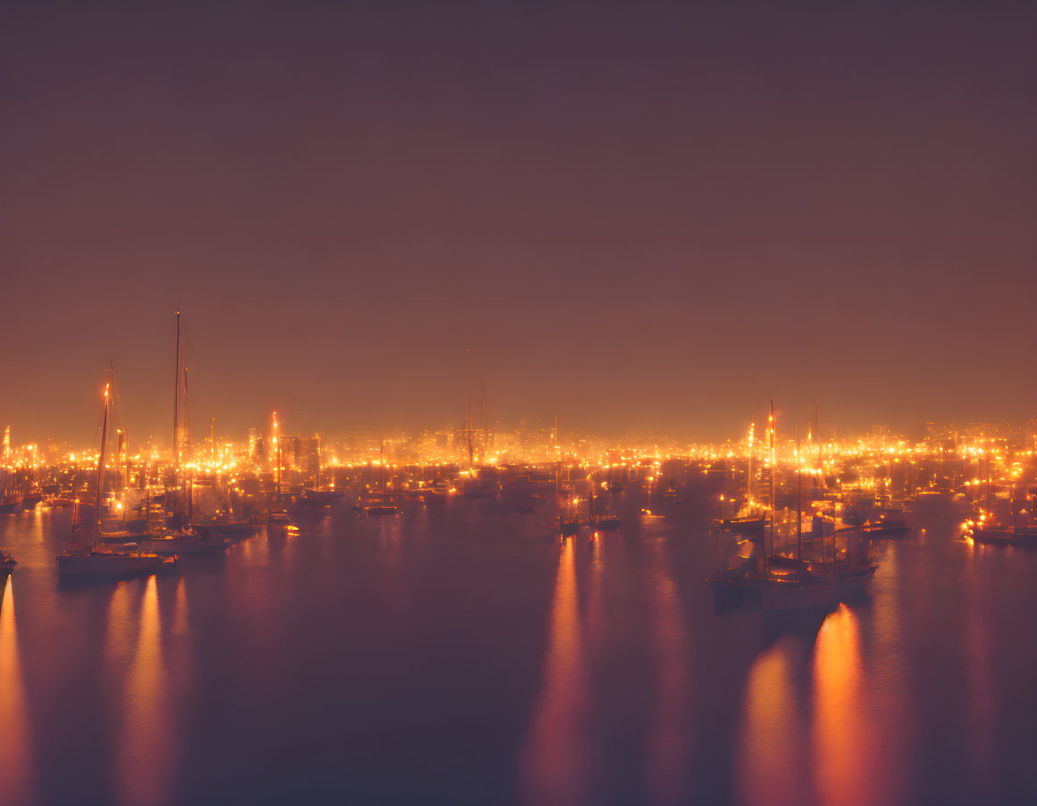 Nighttime Marina Scene: Boats, Lights, and Orange Sky