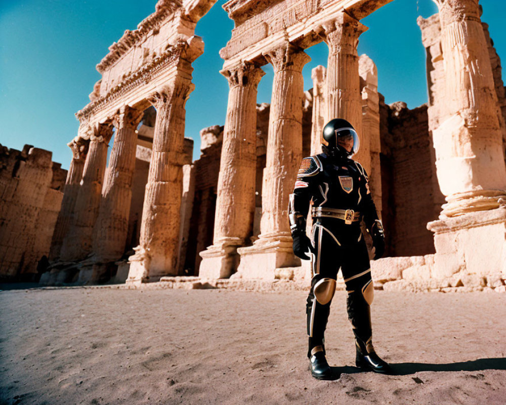 Futuristic black and gold spacesuit in front of ancient Roman-style ruins