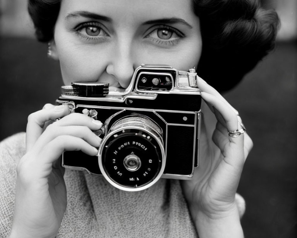 Vintage Style Woman Peering Through Classic Camera