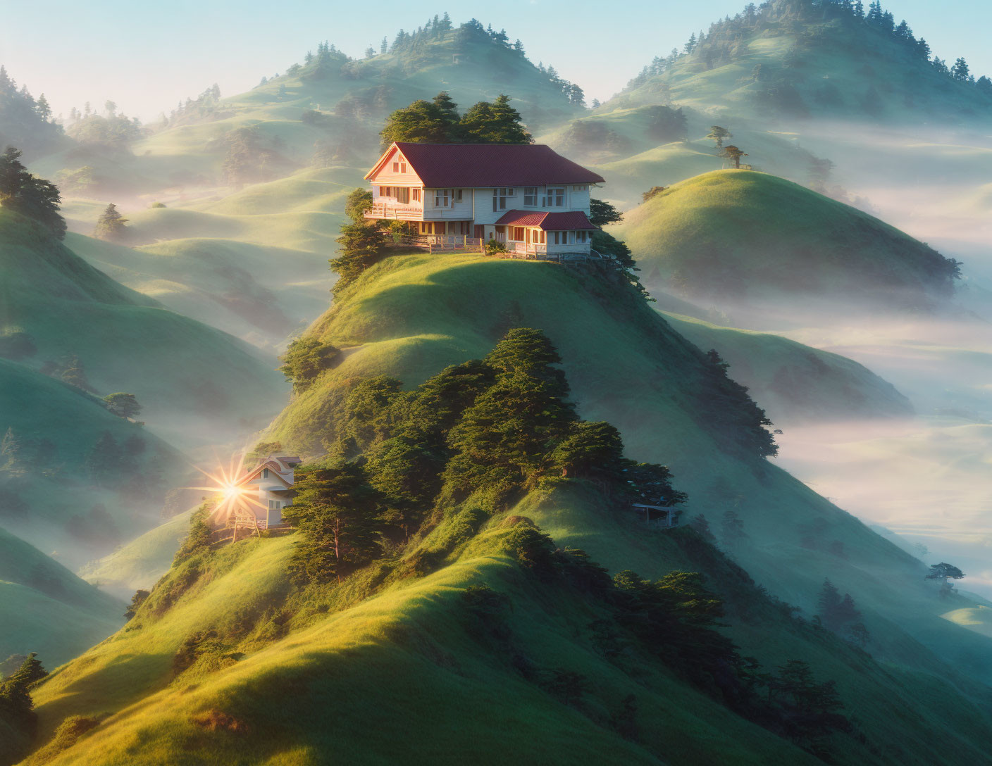 Sunrise view of misty hilltop house and rolling hills with sunbeams.