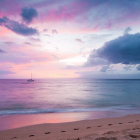 Tranquil sunset seascape with pink and blue skies, sailboat, and storm cloud