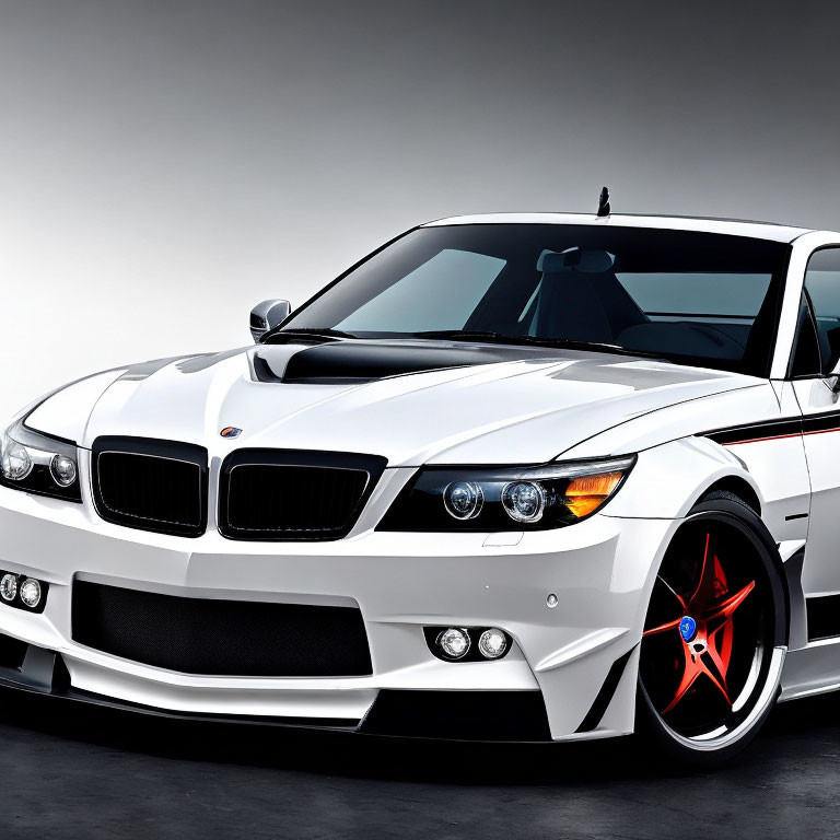 Sporty White BMW with Black and Red Custom Rims and Aggressive Body Kit