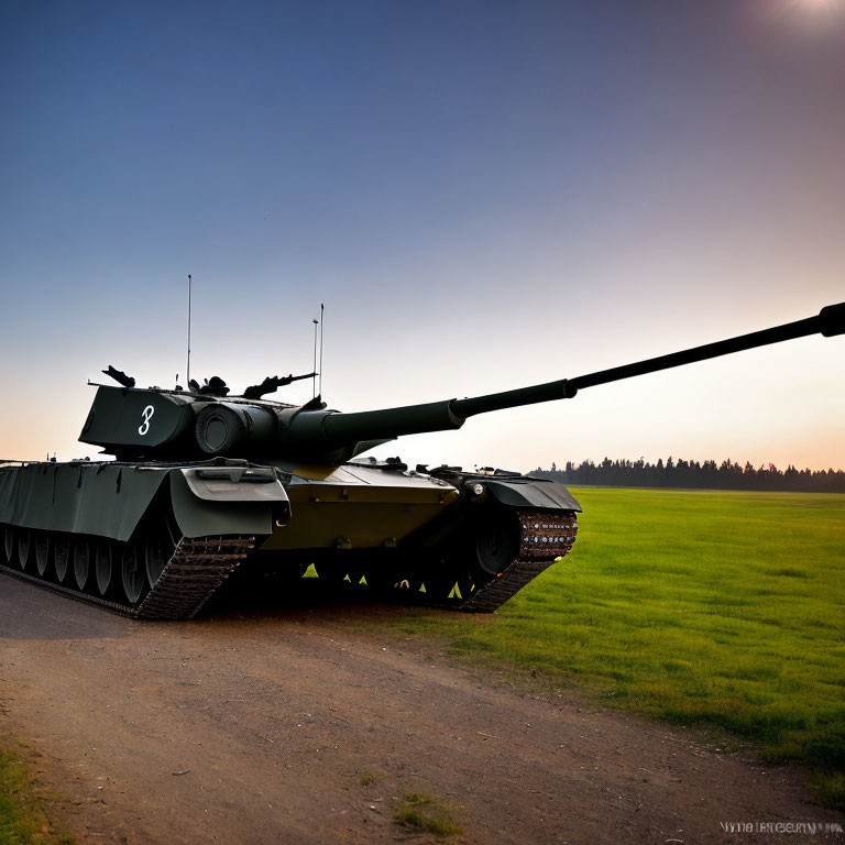 Green military tank on grassy field under sunset sky gradient