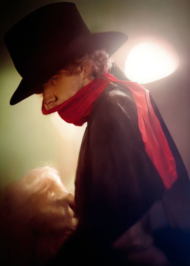 Silhouetted figure in top hat and red scarf under warm glow