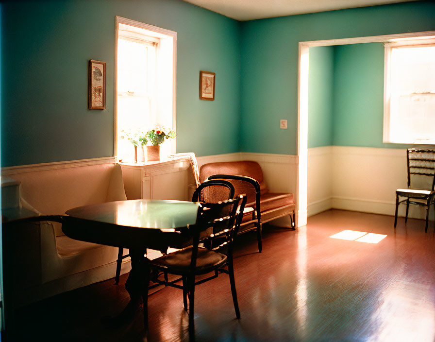 Turquoise-themed cozy room with wooden furniture and natural light.