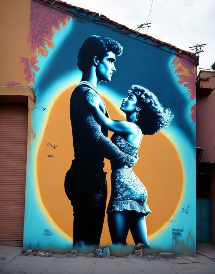 Colorful street art mural of man and woman embracing on orange backdrop