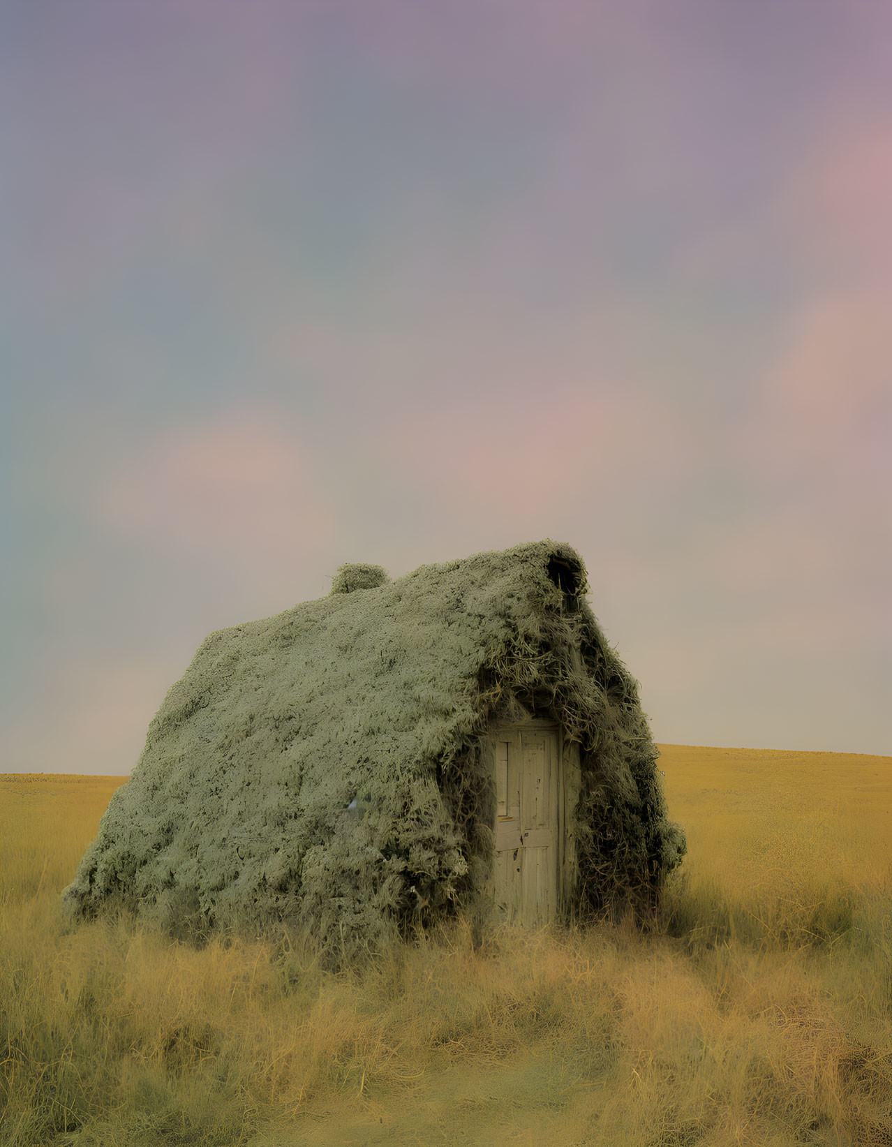 Grass-covered earthen hut with wooden door in tranquil field under pastel sky