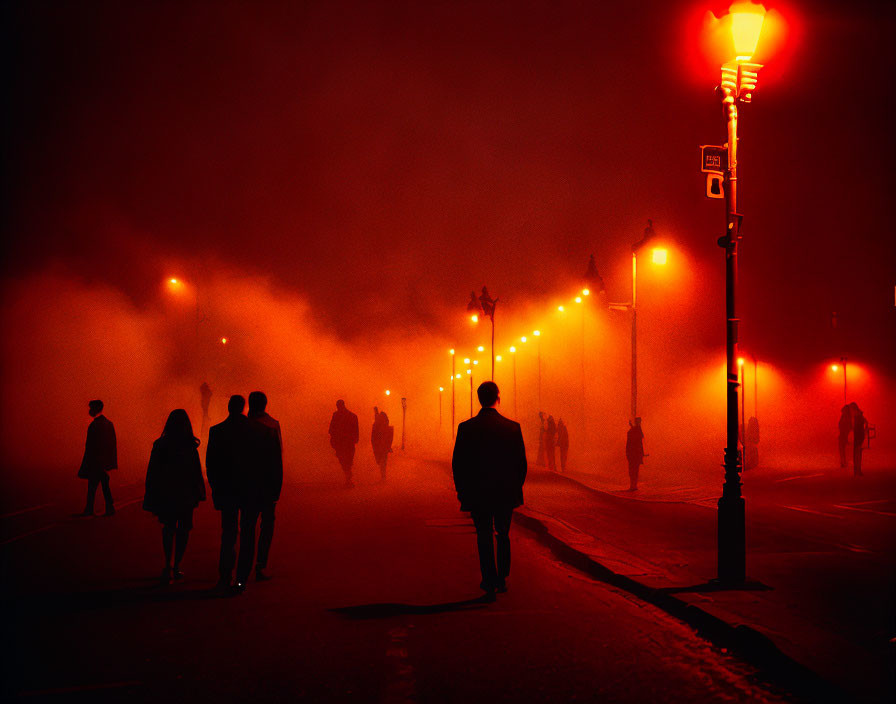 Night scene: Group on misty street under orange streetlights