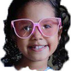 Young girl digital illustration with green eyes, curly hair, and pink rhinestone glasses.