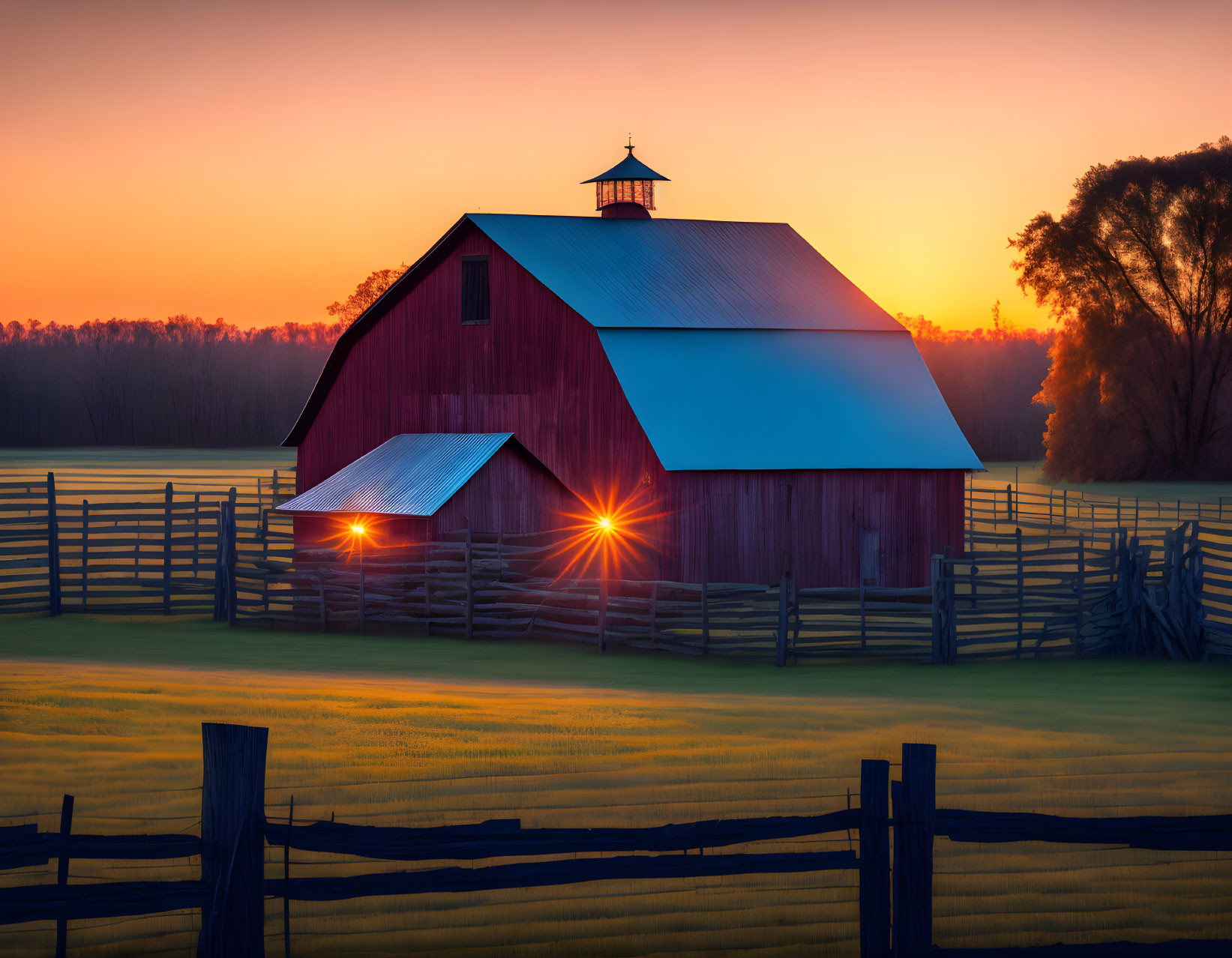Red Barn with Cupola Reflecting Golden Sunrise in Pastoral Field