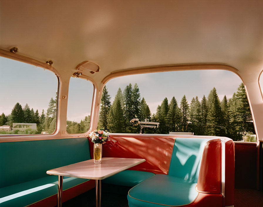 Vintage Diner Car Interior with Red and Turquoise Seating