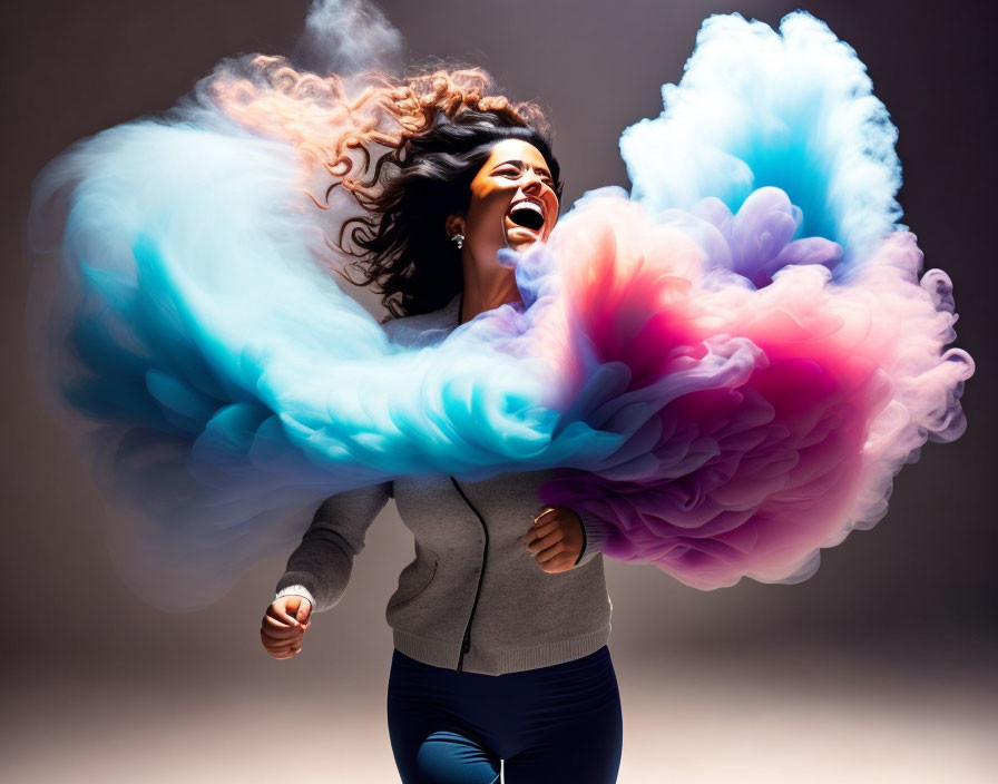 Woman with flowing hair in vibrant blue and pink smoke