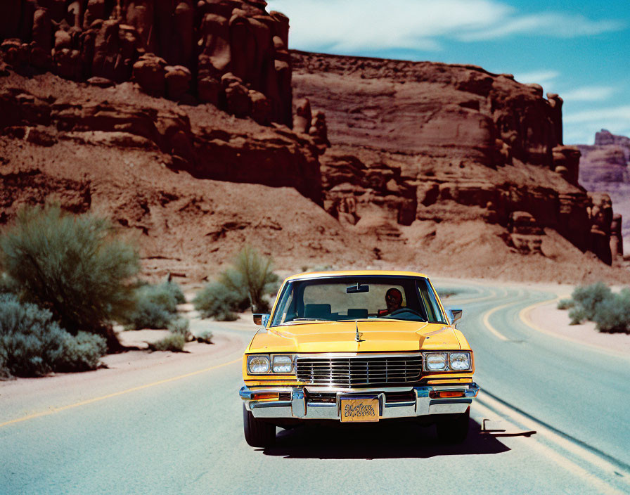 Vintage Yellow Car on Deserted Road with Racing Stripes
