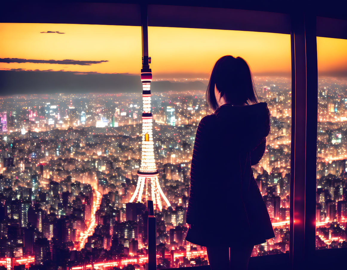 Silhouette admires Tokyo Tower in illuminated cityscape at dusk