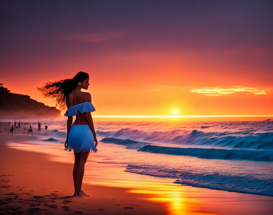 Scenic sunset beach view with woman and distant figures