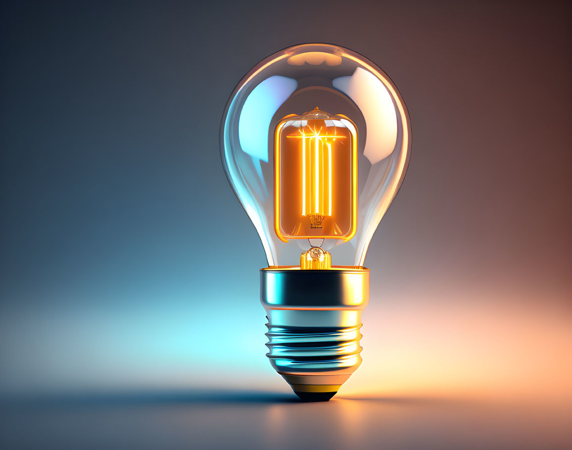 Illuminated tungsten filament light bulb on blue and orange gradient background