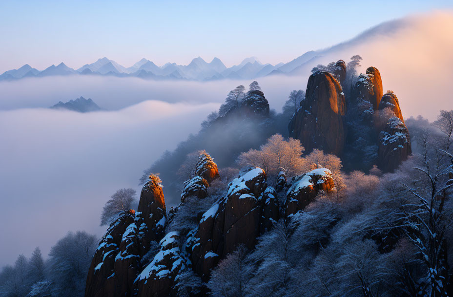 Twilight scene of snow-covered peaks and rocky formations above clouds