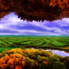 Colorful surreal landscape with rolling hills, textured vegetation, reflective water