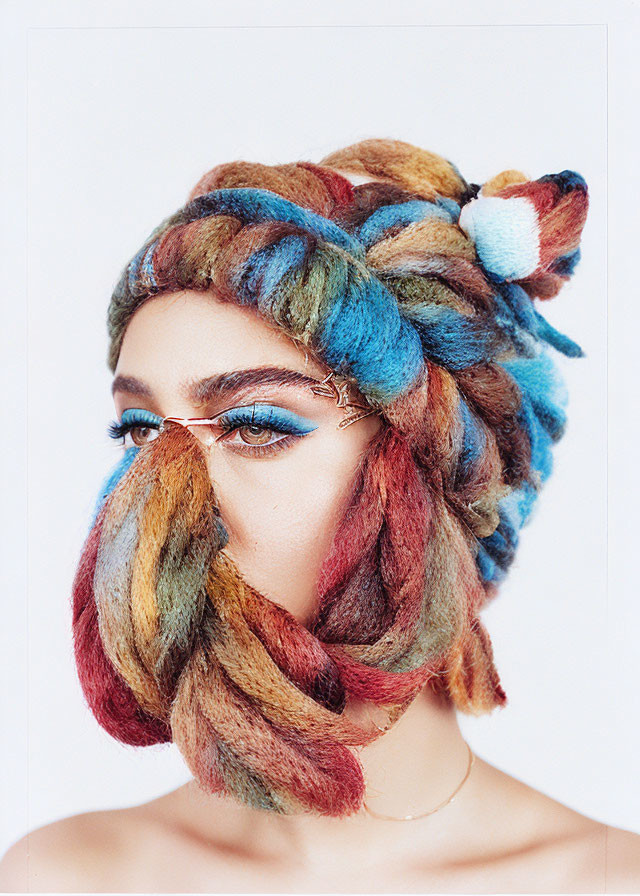 Colorful Wool Woven Hair Braid and Blue Eyeliner Portrait