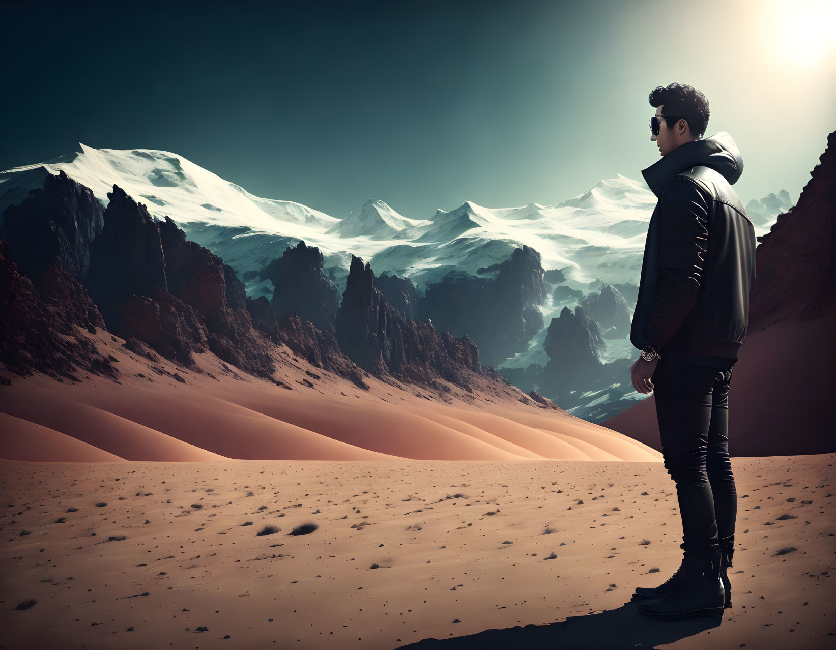 Person in Dark Clothing Gazes at Towering Mountains on Sandy Terrain