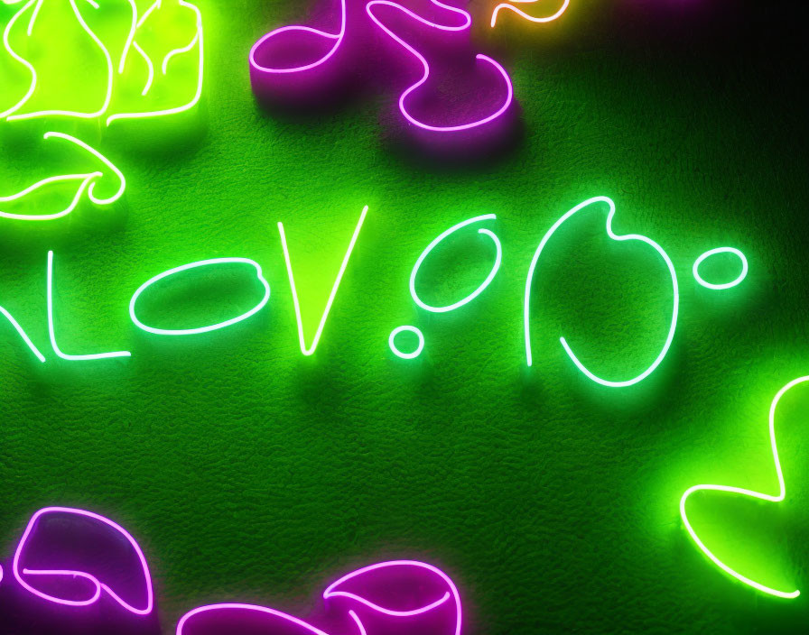 Colorful Heart-Shaped Neon Lights on Green Background