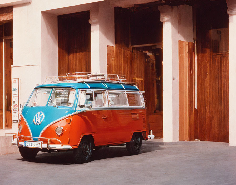 Classic Red and White Volkswagen Van Parked in Urban Setting