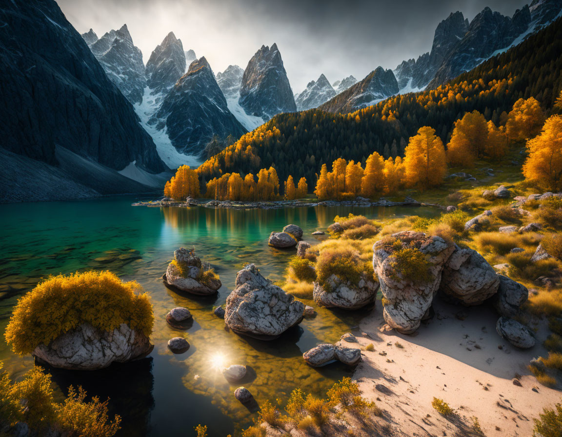 Tranquil mountain lake with turquoise waters and autumn trees nestled among jagged peaks