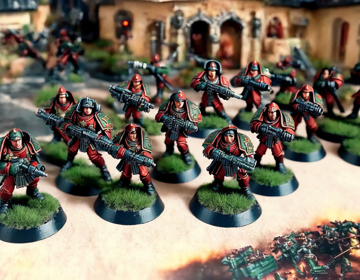 Futuristic red-armored soldier miniatures on modeled battlefield