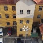3D street mural: Building sinking illusion in urban setting