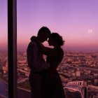 Silhouette of couple embracing by window with city skyline view at twilight