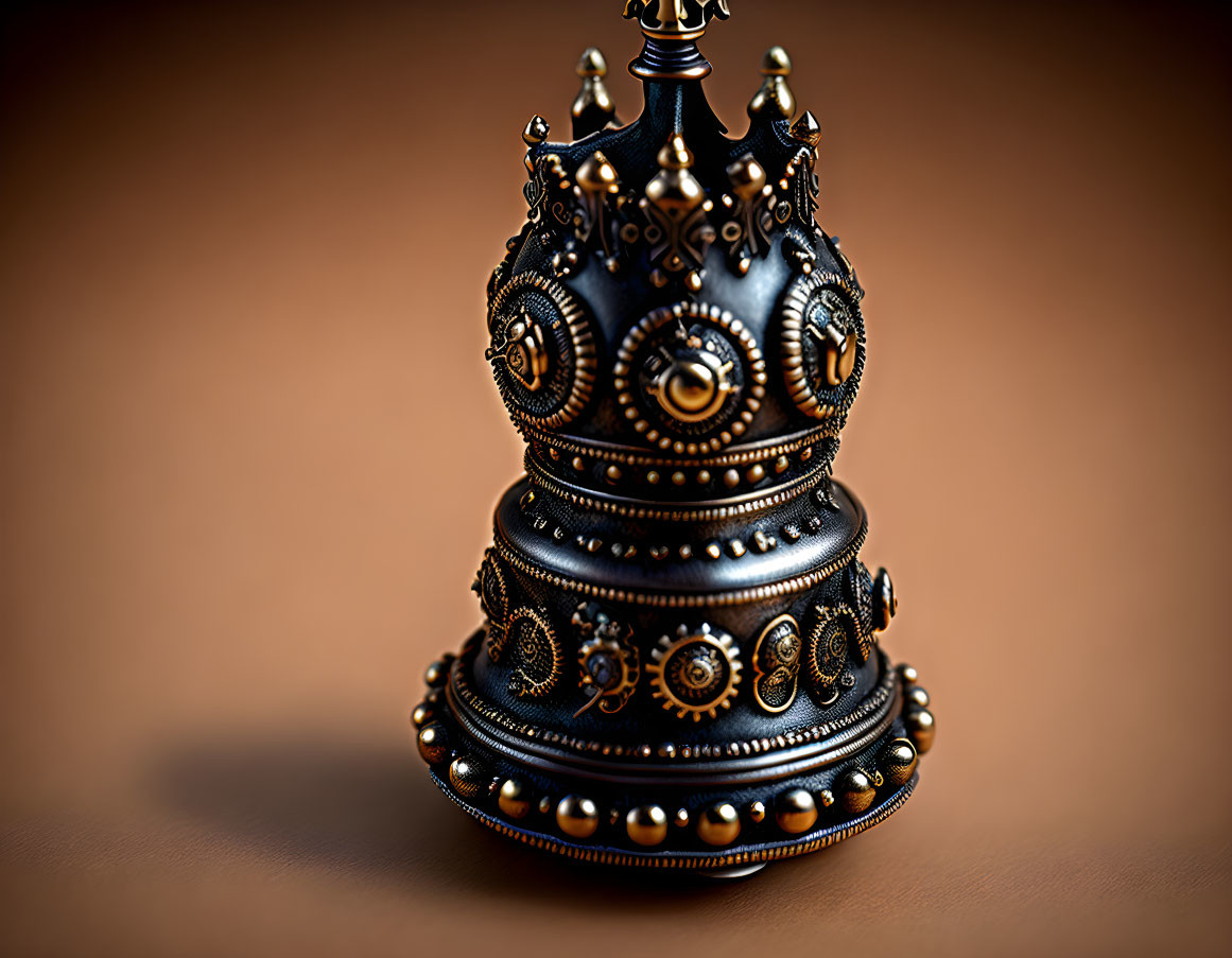 Intricately designed black and gold chess piece resembling a queen on blurred brown background