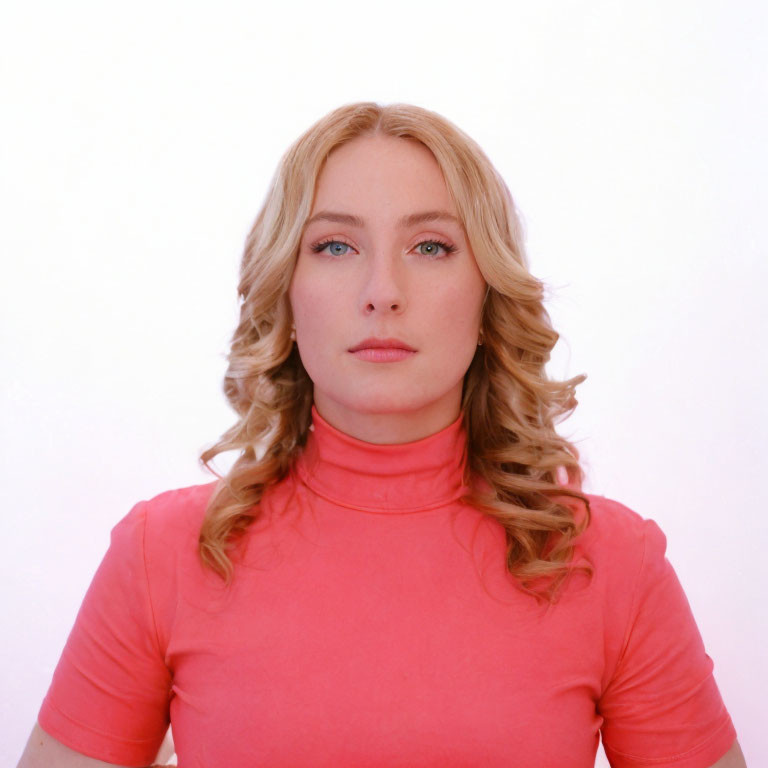 Blonde Woman in Pink Turtleneck on White Background