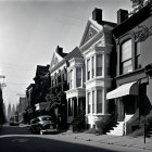 Vintage cars and townhouses in black and white street photo
