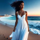 Woman in white dress on beach at sunset with flowing hair, waves, and birds