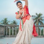 Traditional Indian Attire Woman Poses with Sky Background