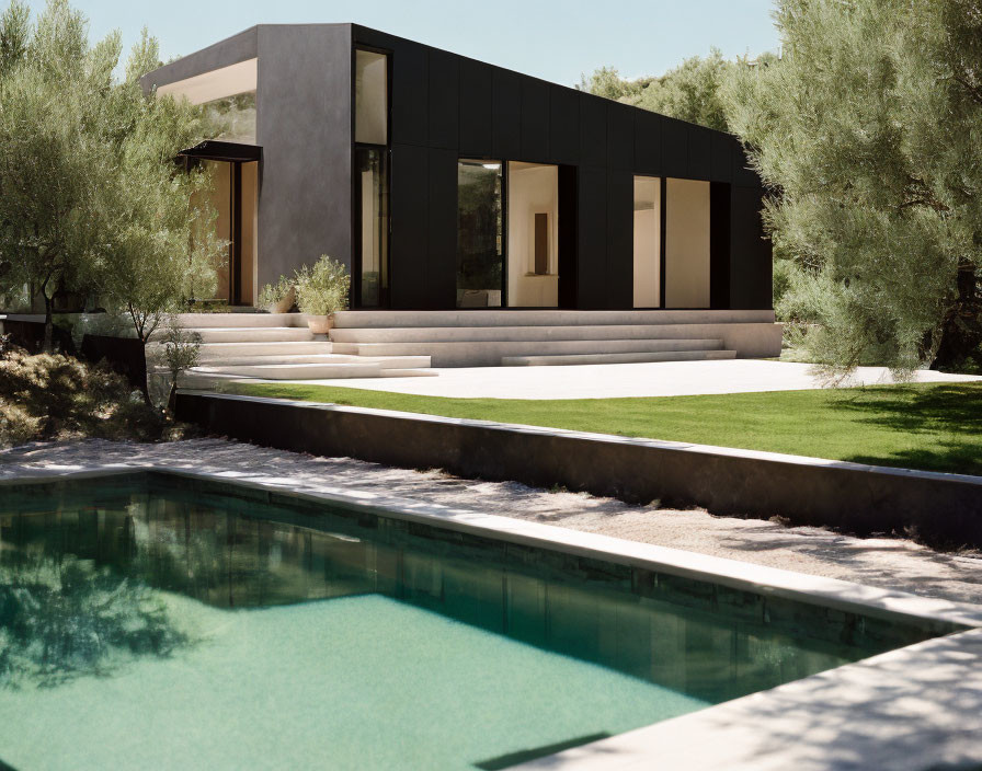 Contemporary House with Large Windows, Flat Roof, Olive Trees, and Turquoise Pool